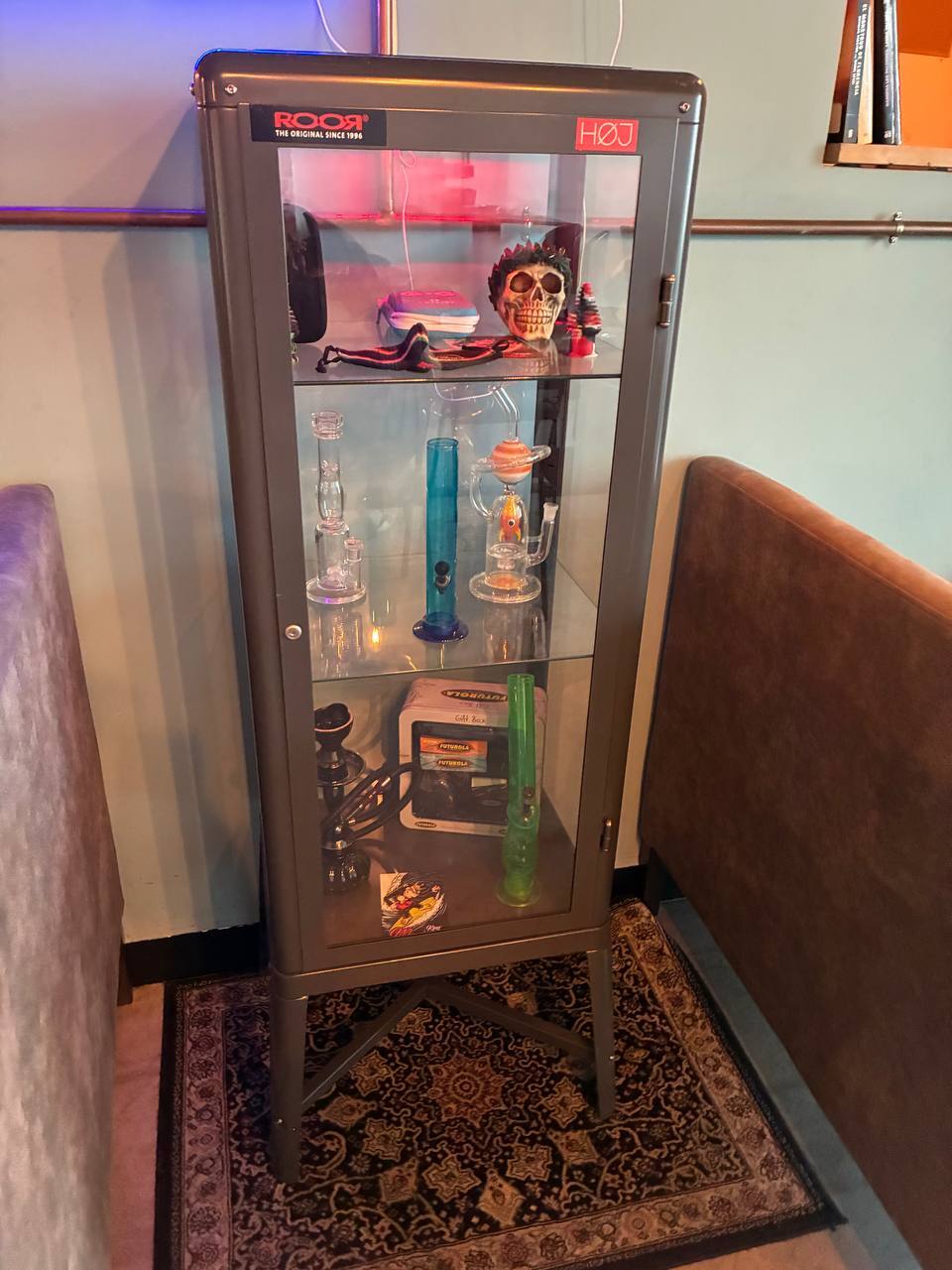 The glass cabinet of pieces.
